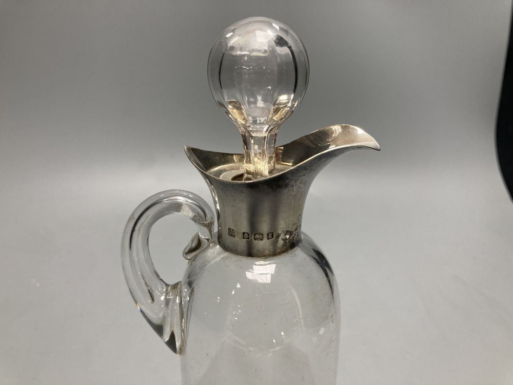 An Edwardian silver mounted glass seven piece liqueur set, by Hukin & Heath, Birmingham, 1906,